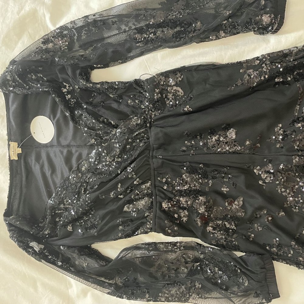 black sequence romper